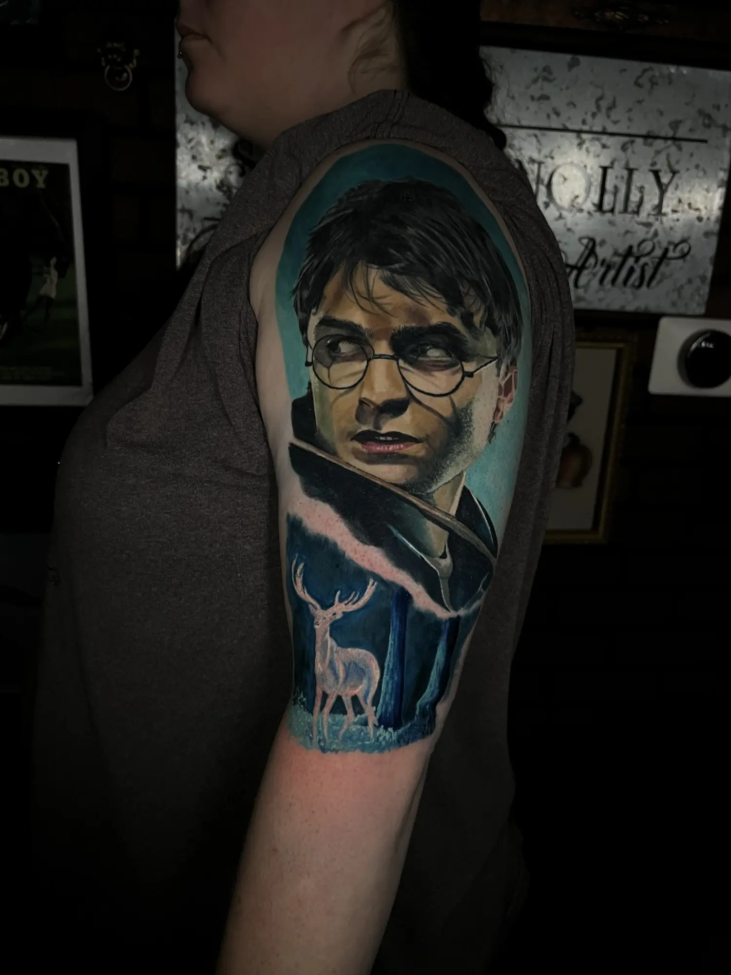 Color realism Harry Potter portrait tattoo with a blue Patronus