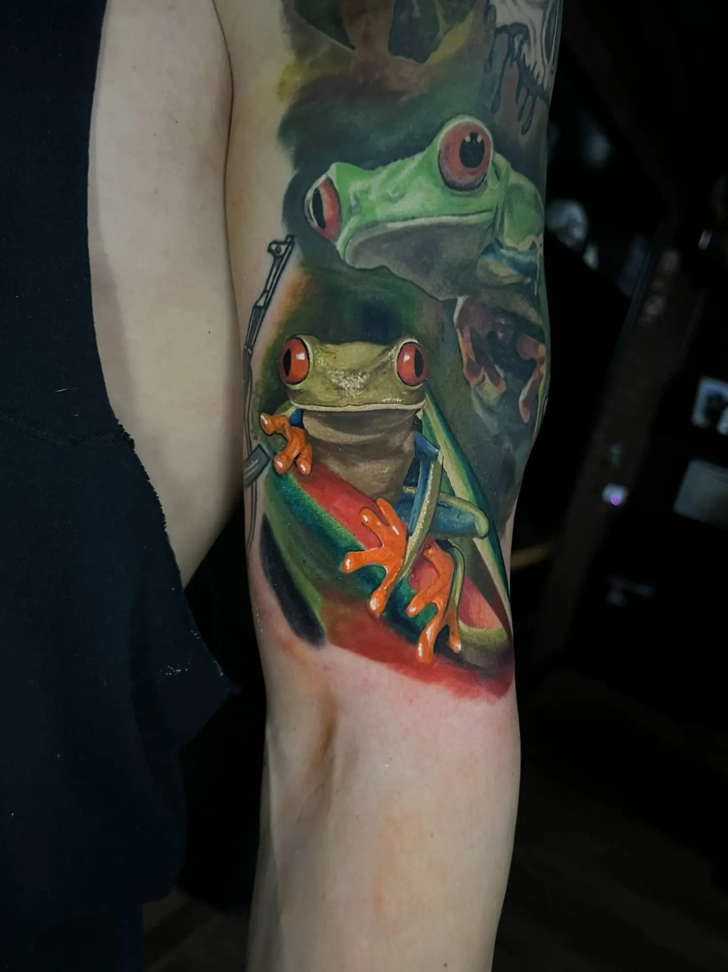 Color realism red-eyed tree frog tattoo