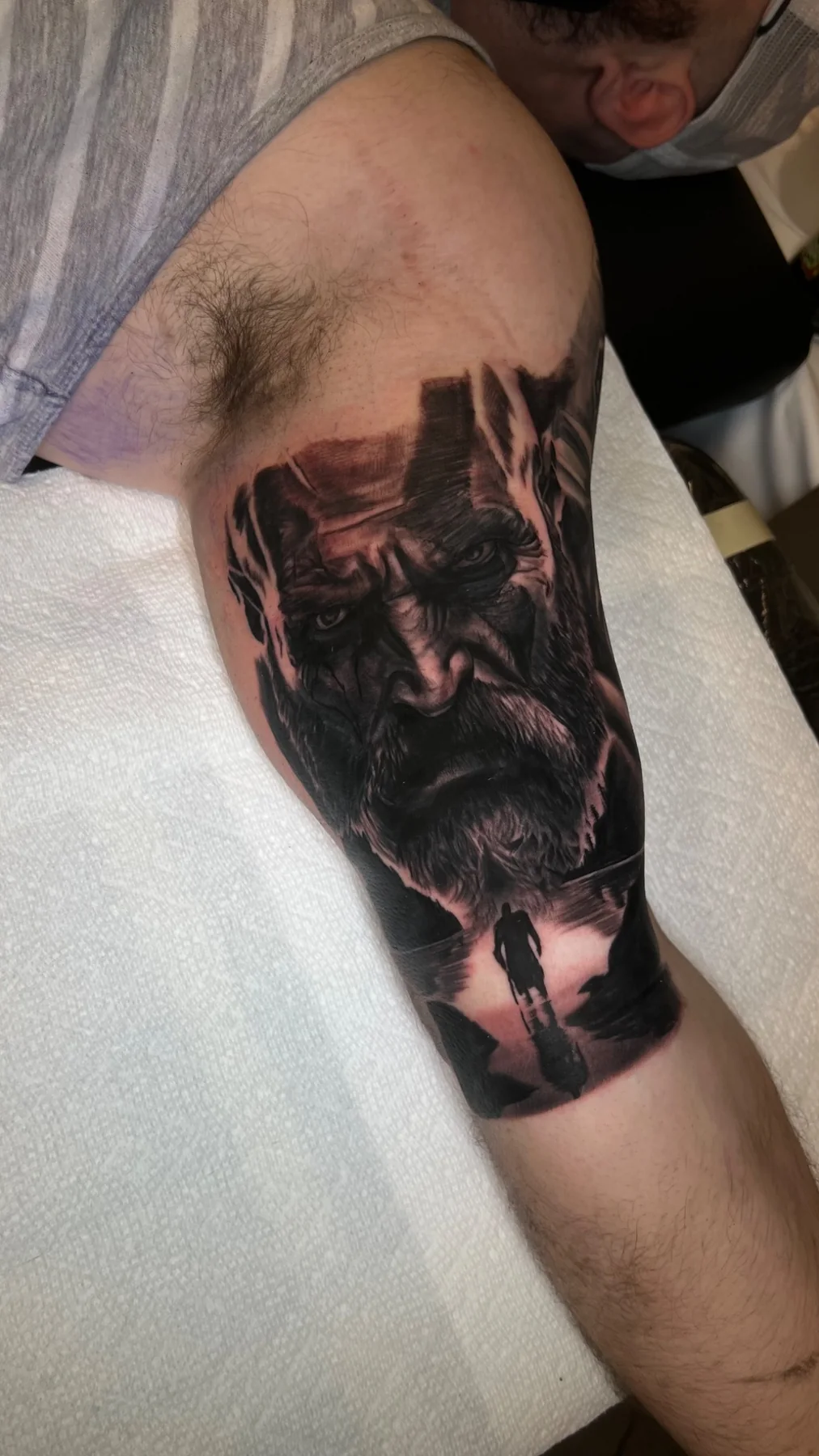 Black and grey realism bearded warrior portrait tattoo