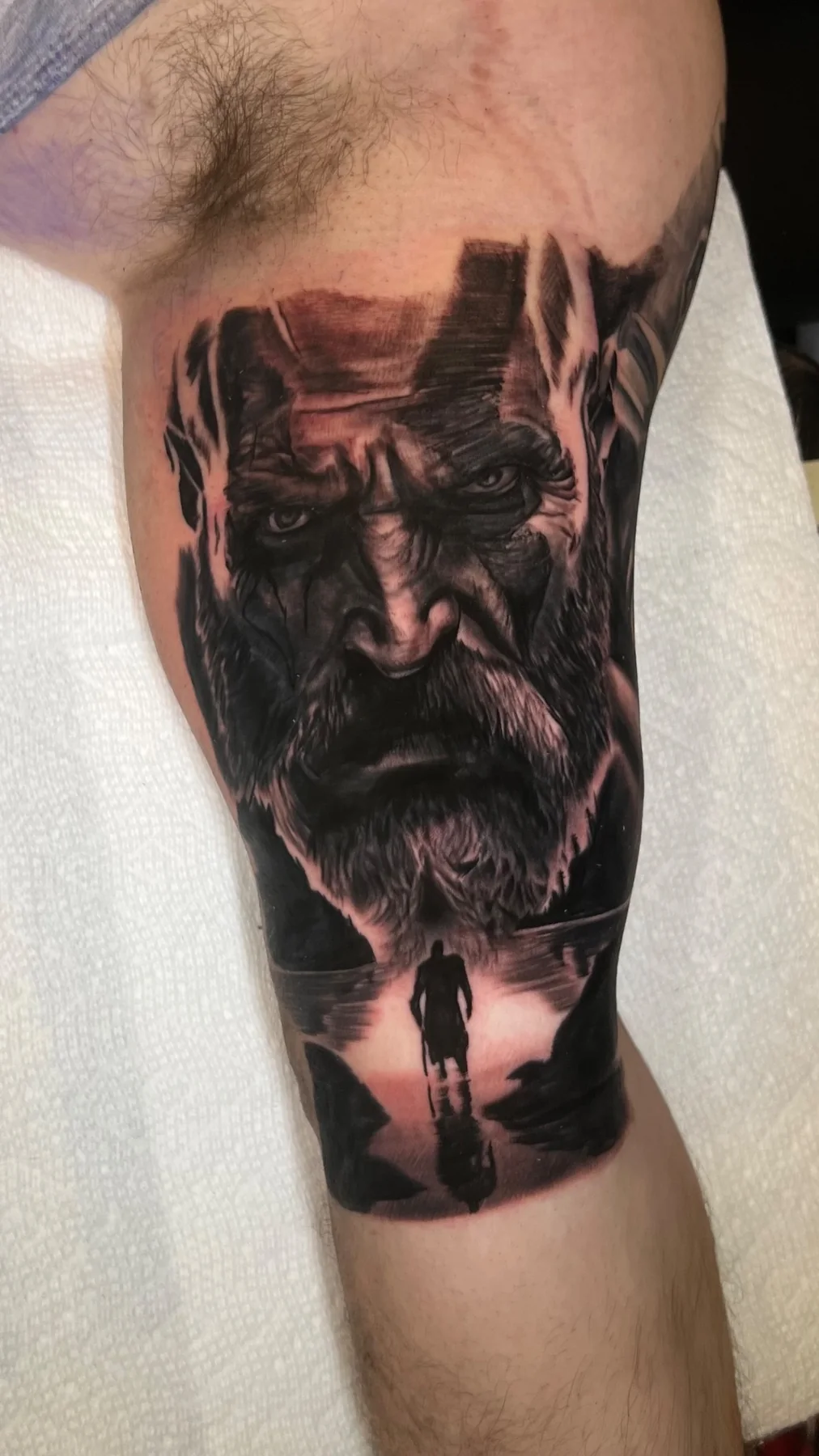 Black and grey realism bearded warrior portrait tattoo, alternate view