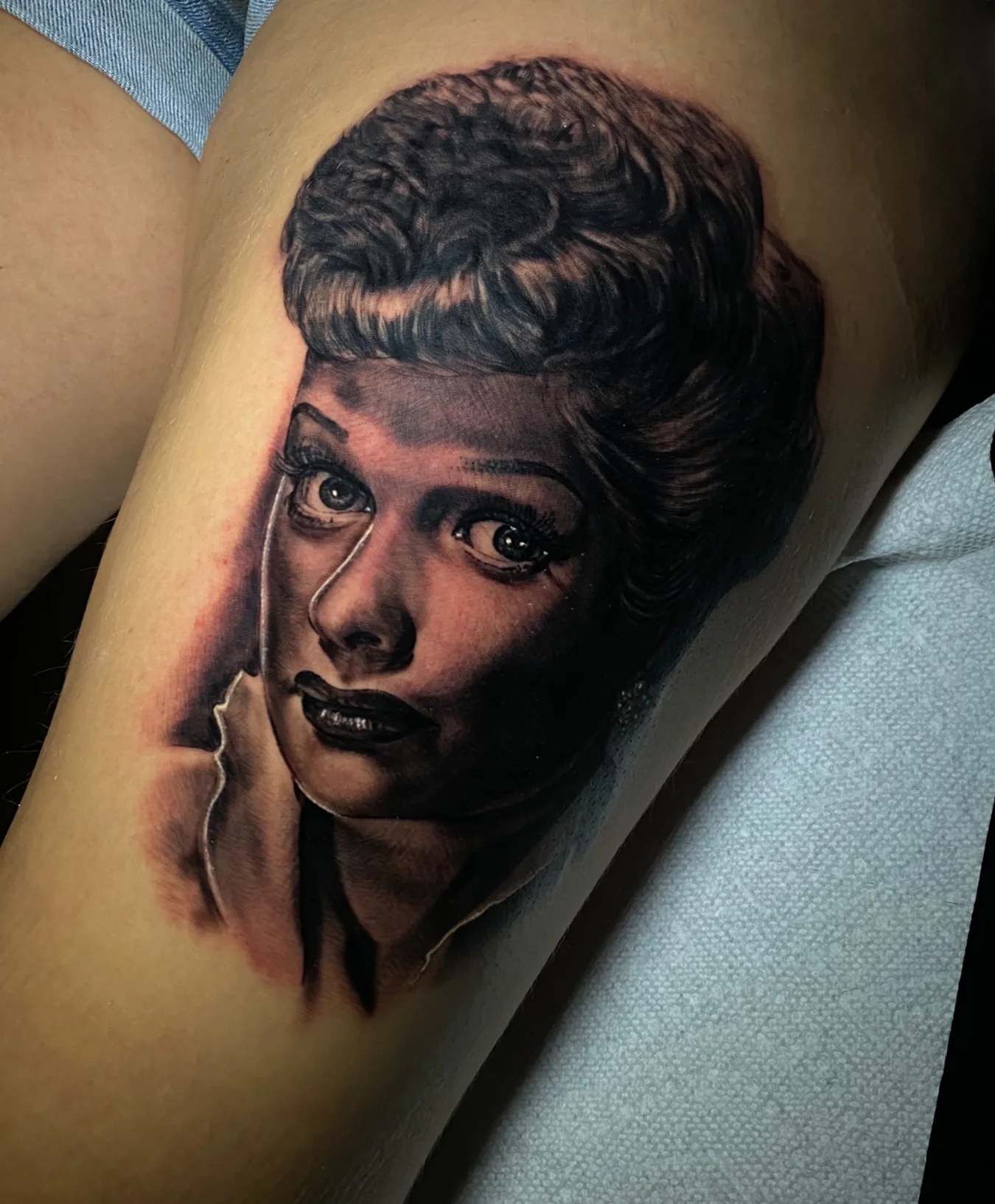 Black and grey cinematic realism forearm tattoo, alternate view